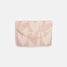 MONEDER CAROLINE GARDNER CORS BLANC I ROSA | 5034931313613 | ECH101 | Llibreria La Gralla | Llibreria online de Granollers